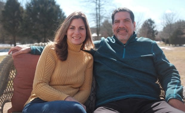 Sharon and Fred Reyes sit outside their home in a Nashville suburb. Fred was hospitalized for 84 days after he contracted COVID-19 in May 2020. Sharon was not allowed to visit for the first six weeks of his hospital stay. 