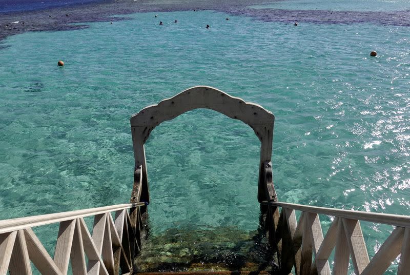 FILE PHOTO: Tourists snorkel near a beach of the Red Sea resort of Sahl Hasheesh, Hurghada