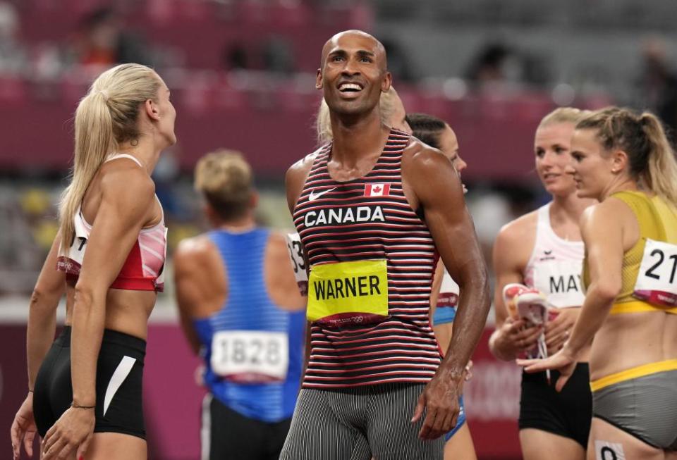 Damian Warner, of Canada celebrates after winning the gold medal in the decathlon.