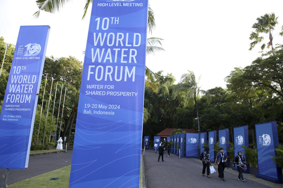 Participants walk at a venue of the 10th World Water Forum in Nusa Dua, Bali, Indonesia on Monday, May 20, 2024. (AP Photo/Firdia Lisnawati)