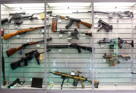 Air guns are seen in a showcase of a gunsmith's shop in Berlin, Germany, January 8, 2016. REUTERS/Hannibal Hanschke/File Photo