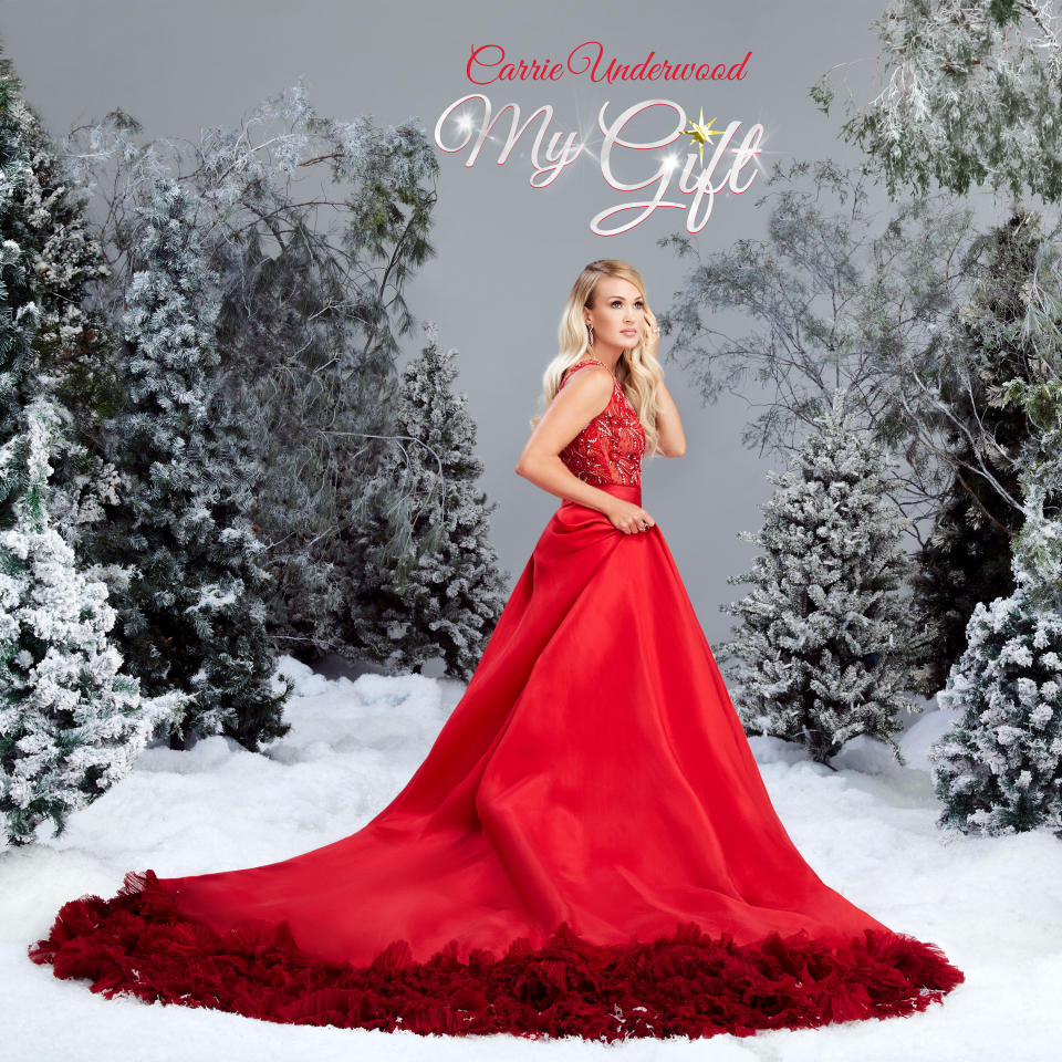 This image provided by Universal Music Group Nashville shows the cover of "My Gift" the newest Christmas album by Carrie Underwood. Underwood's 5-year-old son provided the adorable vocals on “Little Drummer Boy,” one of the 11 tracks on the country superstar’s new Christmas album, out Friday, Sept. 25, 2020. (Joseph Llanes/Universal Music Group Nashville via AP)