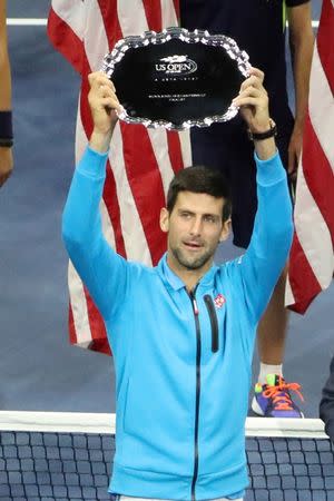 Sep 11, 2016; New York, NY, USA; Novak Djokovic of Serbia displays the finalist trophy after being defeated by Stan Wawrinka of Switzerland in four sets in the championship match on day fourteen of the 2016 U.S. Open tennis tournament at USTA Billie Jean King National Tennis Center. Mandatory Credit: Anthony Gruppuso-USA TODAY Sports