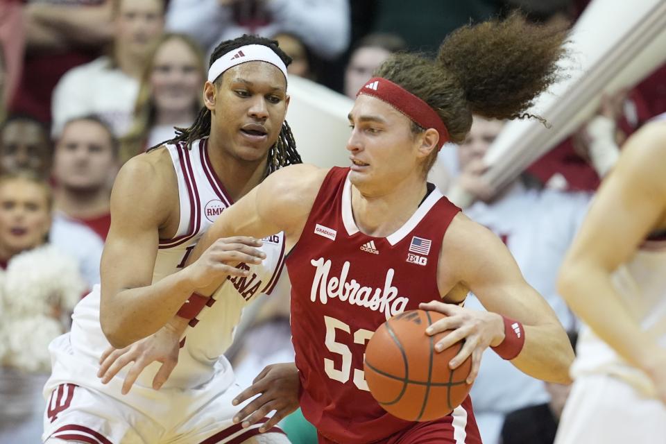 Nebraska forward Josiah Allick (53) goes to the basket against Indiana forward Malik Reneau (5) during the second half of an NCAA college basketball game, Wednesday, Feb. 21, 2024, in Bloomington, Ind. (AP Photo/Darron Cummings)