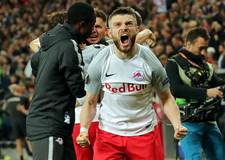 Red Bull Salzburg players celebrate their team's 4-1 victory over Lazio in the Europa League quarter final second leg