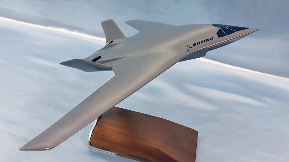 A model depicting a blended wing body concept that Boeing unveiled earlier this year. This design, which could be adapted to airlift and aerial refueling roles, is intended to take off and land conventionally. <em>Boeing</em>