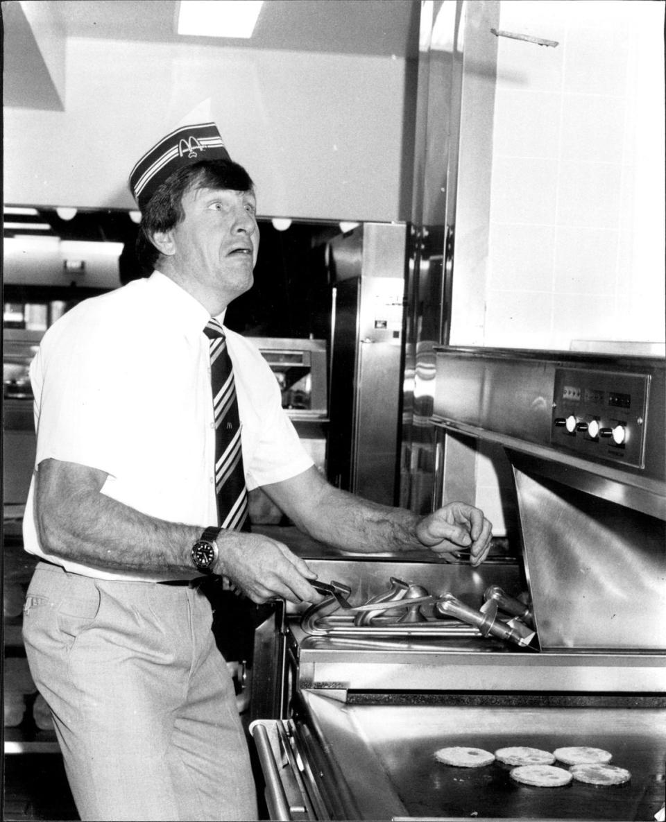 <p>Former rugby league player, Ron Coote, celebrated the opening of his McDonald's restaurant by flipping burgers in the back.</p>