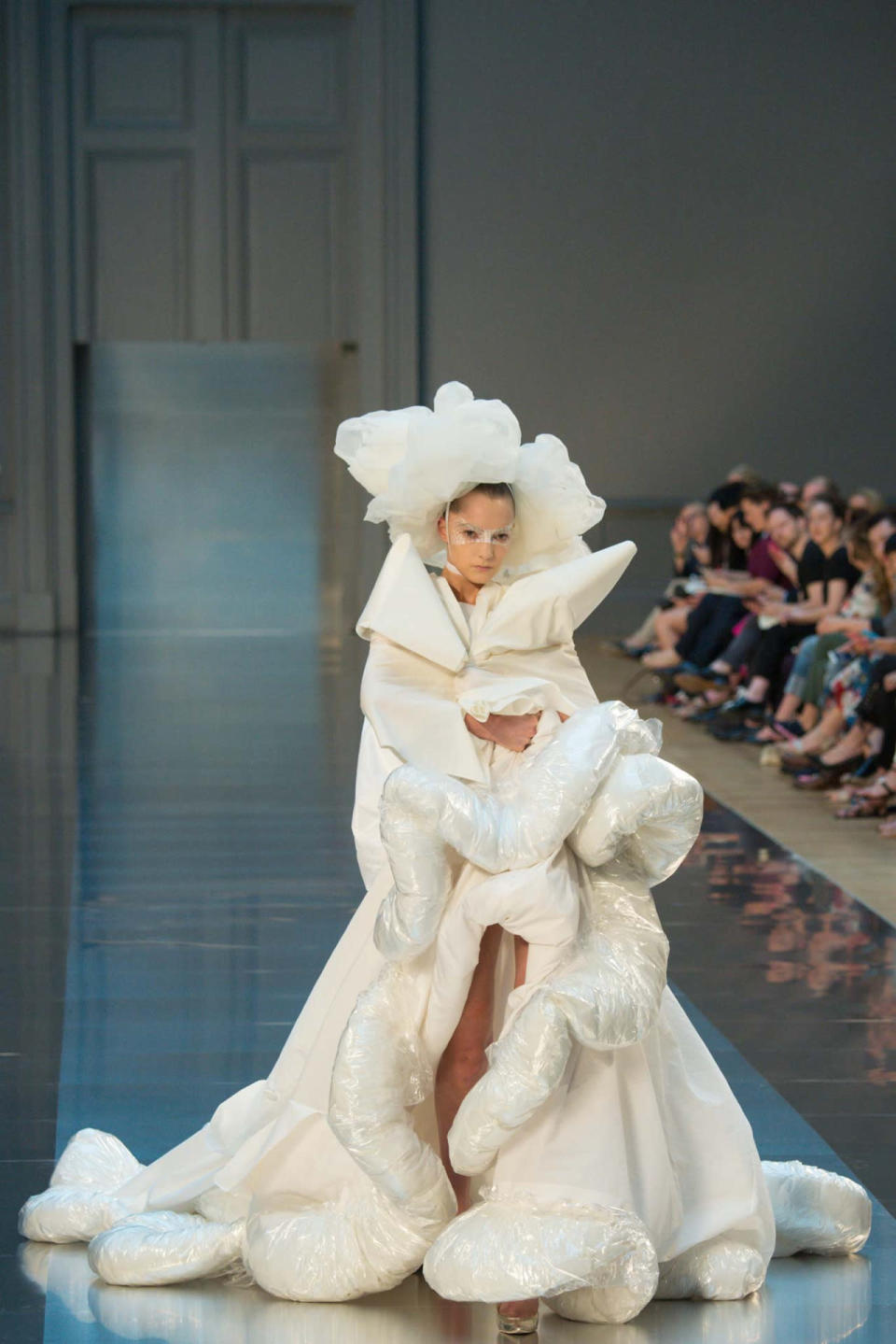 <p>John Galliano’s second couture collection for the house of Martin Margiela showcased the designer’s epic range and referenced Margiela’s ability to take any material and make it glamorous. Case in point: his bride who, although gorgeous, looked like she was wearing a duvet wrapped in plastic!</p>