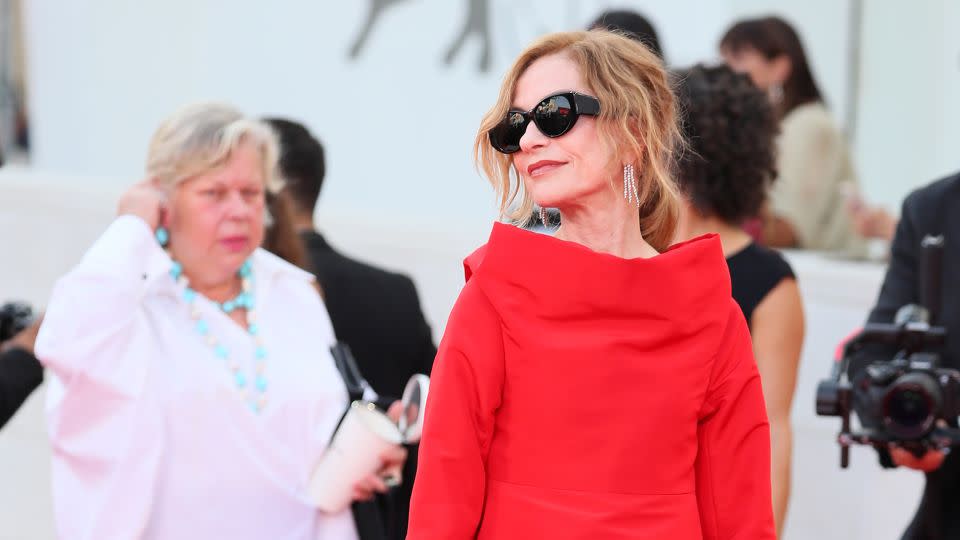 Isabelle Huppert's Balenciaga couture opera coat was inspired by theater goers of the 1950s. - JB Lacroix/FilmMagic/Getty Images