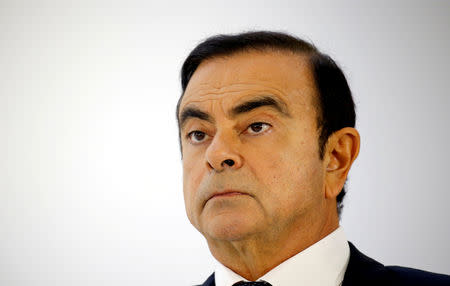 FILE PHOTO: Carlos Ghosn, chairman and CEO of the Renault-Nissan-Mitsubishi Alliance, attends a press conference on the second press day of the Paris auto show, in Paris, France, October 3, 2018. REUTERS/Regis Duvignau/File Photo