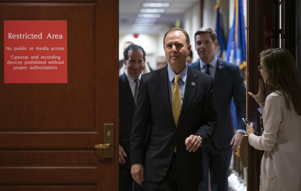 House Intelligence Committee Chairman Adam Schiff, D-Calif., followed by Rep. Jamie Raskin, D-Md., left, and Rep. Eric Swalwell, D-Calif., leaves a secure area at the Capitol to speak to reporters, in Washington, Monday, Oct. 28, 2019. Schiff announced that former deputy national security adviser Charles Kupperman failed to appear to be interviewed in the impeachment inquiry of President Donald Trump as lawmakers try to the determine if the president violated his oath of office by asking a foreign country, Ukraine, to investigate his political opponent, former Vice President Joe Biden, and his son Hunter Biden. (AP Photo/J. Scott Applewhite)