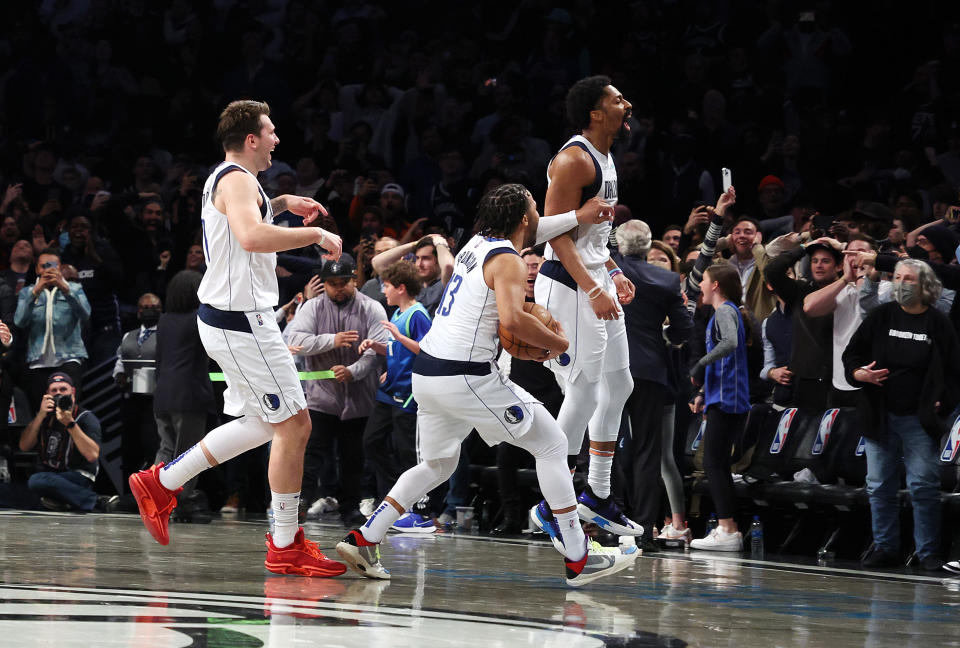 NEW YORK, NEW YORK - MARCH 16:  Spencer Dinwiddie #26 of the Dallas Mavericks celebrates after hitting a game winning shot with no time on the clock to defeat the Brooklyn Nets 113-11 during their game at Barclays Center on March 16, 2022 in New York City.  NOTE TO USER: User expressly acknowledges and agrees that, by downloading and or using this photograph, User is consenting to the terms and conditions of the Getty Images License Agreement.  (Photo by Al Bello/Getty Images)