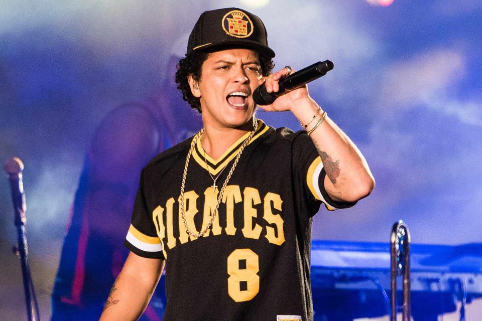 <p>Chris Tuite/Imagespace/Shutterstock</p> Bruno Mars performs in Napa, California in May 2018