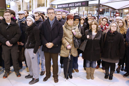 People gather at the Gare de Lyon train station in Paris, January 8, 2015. REUTERS/ Youssef Boudlal