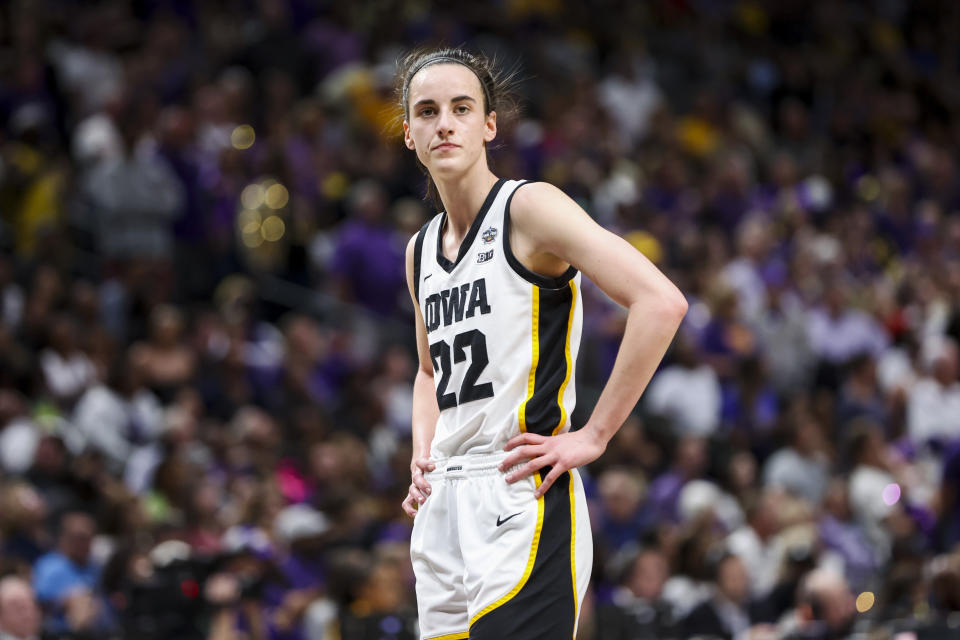 Apr 2, 2023; Dallas, TX, USA; Iowa Hawkeyes guard Caitlin Clark (22) stands on the court during a stop in play against the LSU Lady Tigers in the first half during the final round of the Women's Final Four NCAA tournament at the American Airlines Center. Mandatory Credit: Kevin Jairaj-USA TODAY Sports