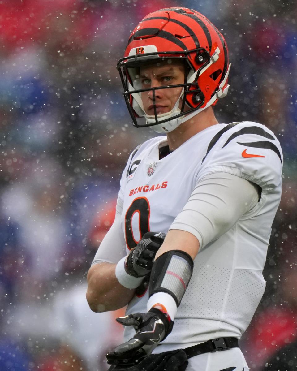 Cincinnati Bengals quarterback Joe Burrow (9) warm ups before an NFL divisional playoff football game between the Cincinnati Bengals and the Buffalo Bills, Sunday, Jan. 22, 2023, at Highmark Stadium in Orchard Park, N.Y.