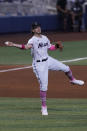 Miami Marlins third baseman Brian Anderson throws to first base on a hit by Milwaukee Brewers' Luis Urias, during the fourth inning of a baseball game, Sunday, May 9, 2021, in Miami. (AP Photo/Marta Lavandier)