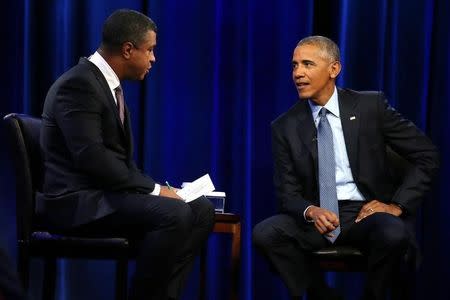 U.S. President Barack Obama attends a town hall interview with ESPN anchor Stan Verrett on "sports, race and achievements" at North Carolina Agricultural and Technical State University in Greensboro, North Carolina, U.S. October 11, 2016. REUTERS/Carlos Barria