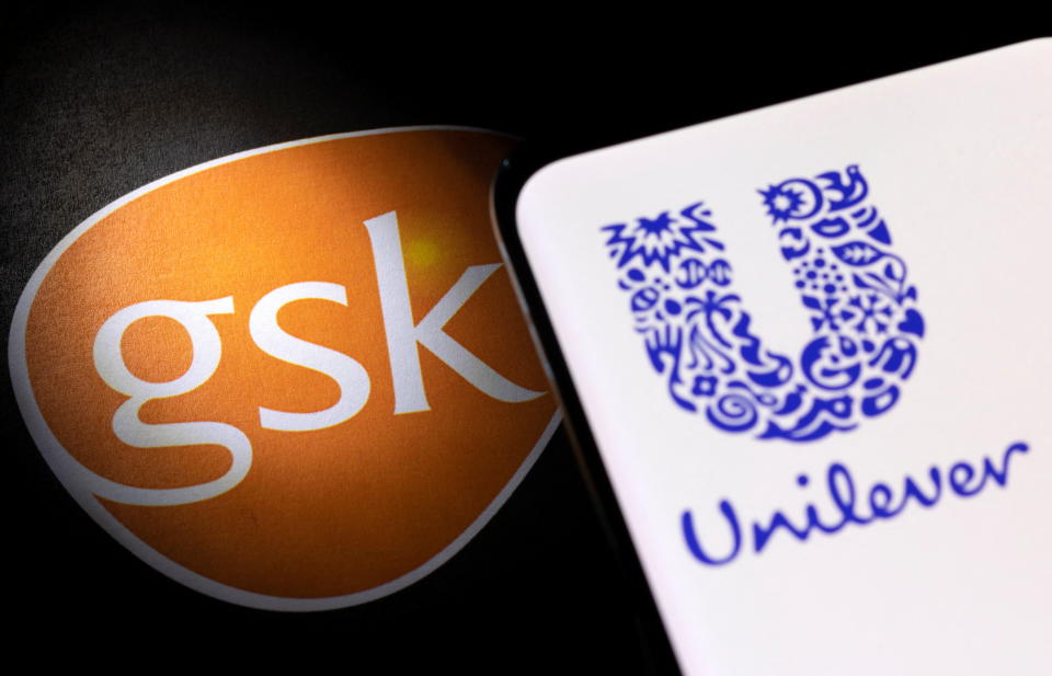 Smartphone with displayed Unilever logo is pictured next to GSK logo in this illustration taken on January 17, 2022. REUTERS/Dado Ruvic/Illustration