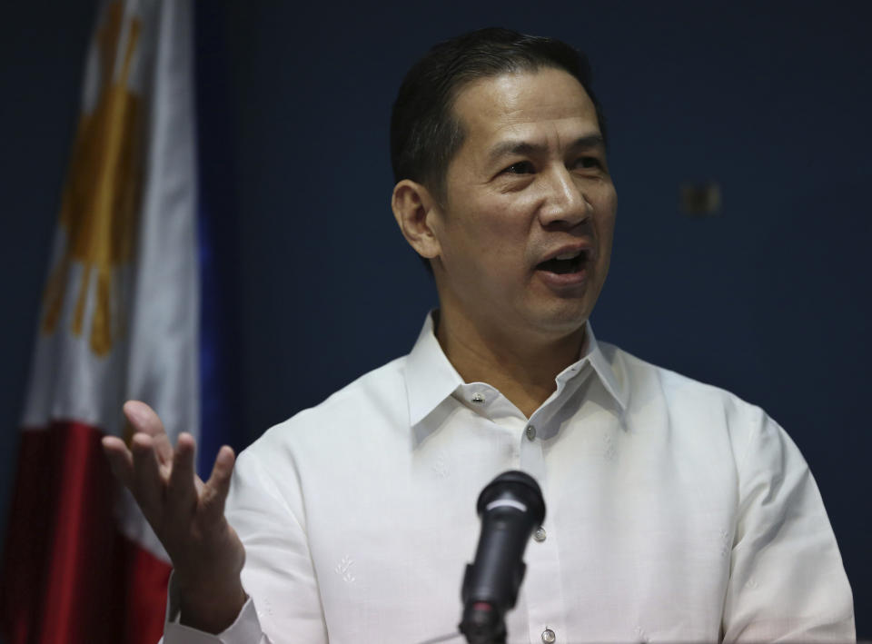 Philippine Foreign Affairs Department spokesman Raul Hernandez gestures as he answers questions from reporters during a press conference at Foreign Affairs headquarters in suburban Pasay, south of Manila, Philippines on Tuesday, Feb. 25, 2014. The Philippines has called in a Chinese envoy to protest what it says was the firing of a water cannon by a Chinese government vessel on Filipino fishermen in a disputed shoal in the South China Sea. (AP Photo/Aaron Favila)