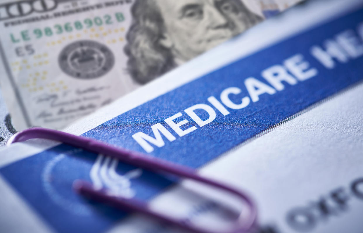 THE SEA RANCH, CALIFORNIA - November 12, 2018: Medicare Health Insurance and Social Security card on medical report with stethoscope. Medicare is a national health insurance program provided by the United States for seniors 65 and older.  Social Security is a federal insurance program that gives benefits to retired, unemployed and disabled people.