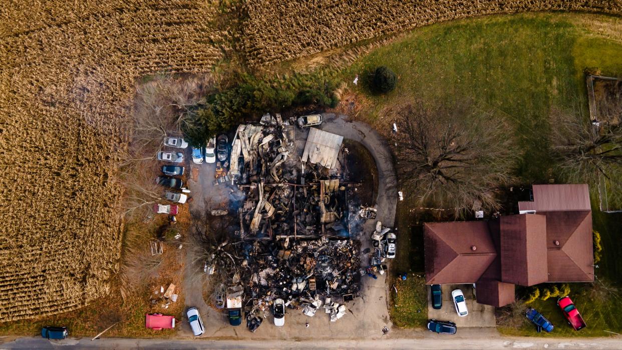 An overhead aerial photograph shows the remains of Lincolns and Things, Tuesday, Dec. 7, 2021 in Sherrodsville. A fire yesterday afternoon leveled the structure, which also warehoused approximately $8000 worth of toys for the Tuscarawas County Toys for Tots program.