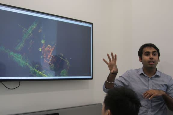 An Otsaw employee demonstrates the O-R3's 3D mapping abilities. The O-R3 can create 3D maps from its LIDAR sensors.