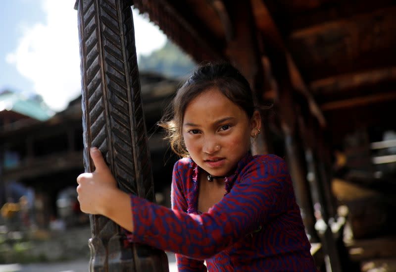 The Wider Image: Doctors scale rockslides, invoke gods to vaccinate Himalayan villages