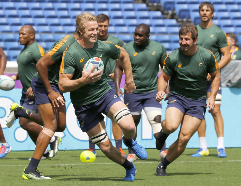 South Africa’s Pieter-Steph du Toit carries a ball during the team's training for the Rugby World Cup in Yokohama, near Tokyo, Friday, Sept. 20, 2019. South Africa will play against New Zealand in Pool B on Saturday, Sept. 21. (Kyodo News via AP)