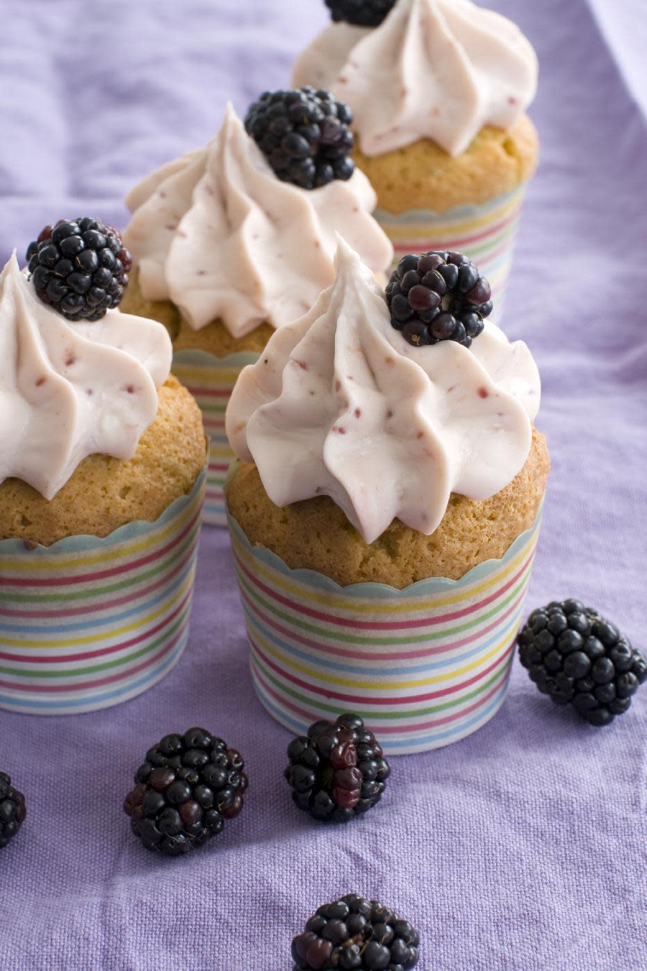 In this image taken on March 18, 2013, fruit punch spring cupcakes are shown in Concord, N.H. (AP Photo/Matthew Mead)