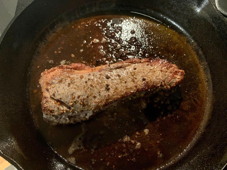 steak looking grayish in pan