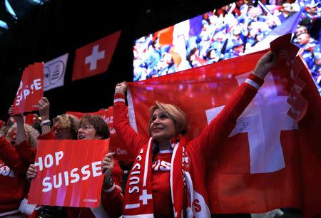 Switzerland fans cheer on their team during the Davis Cup final singles tennis match against France at the Pierre-Mauroy stadium in Villeneuve d'Ascq, near Lille, November 21, 2014. REUTERS/Pascal Rossignol