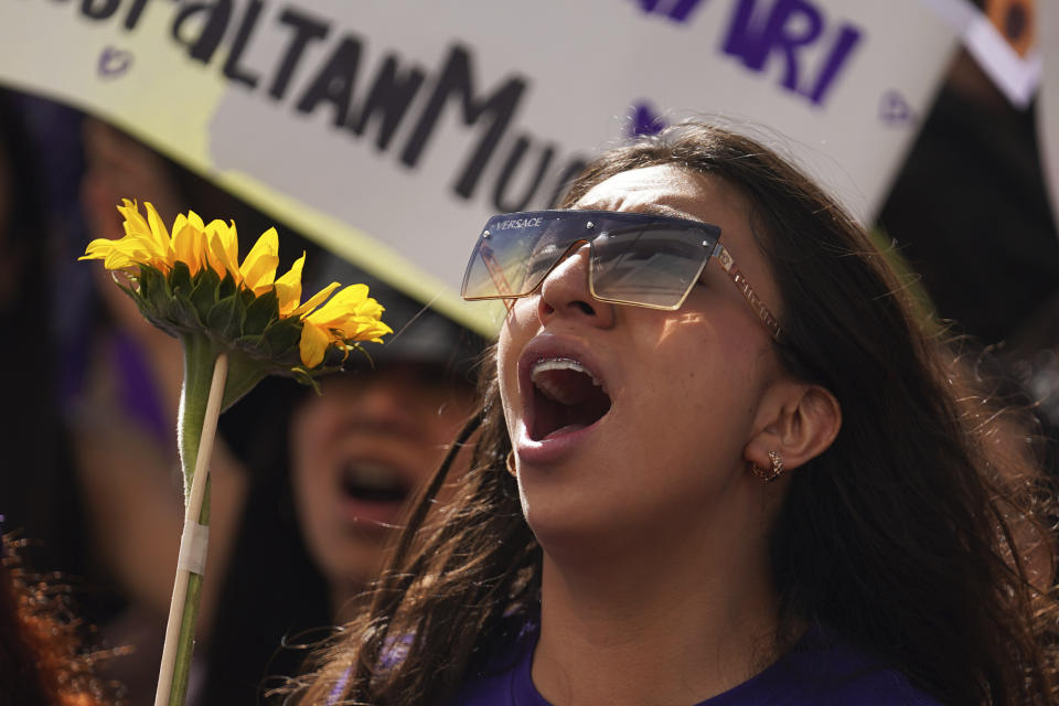 Feminist groups march to protest the murder of Ariadna Lopez, in Mexico City, Monday, Nov. 7, 2022. Prosecutors said Sunday an autopsy on Lopez who was found dead in the neighboring state of Morelos, showed she was killed by blunt force trauma. That contradicts a Morelos state forensic exam that suggested the woman choked on her own vomit as a result of intoxication. (AP Photo/Marco Ugarte)