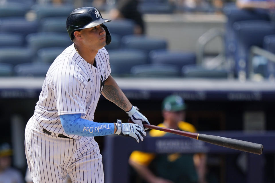 New York Yankees' Gary Sanchez reacts after hitting a two-run double during the sixth inning of a baseball game against the Oakland Athletics, Sunday, June 20, 2021, at Yankee Stadium in New York. (AP Photo/Kathy Willens)