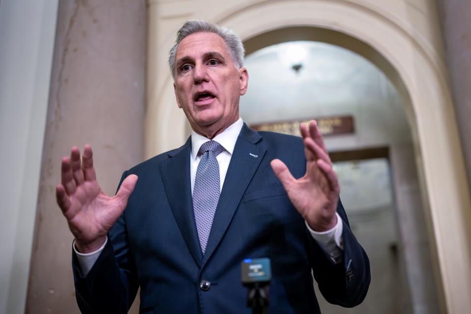 House Speaker Kevin McCarthy, R-Calif., talks to reporters as Congress returns to work in crisis mode with four days to go before a government shutdown, at the Capitol in Washington, Tuesday, Sept. 26, 2023. McCarthy faces an insurgency from hard-right Republicans eager to slash spending even if it means closing federal offices to millions of Americans. (AP Photo/J. Scott Applewhite)