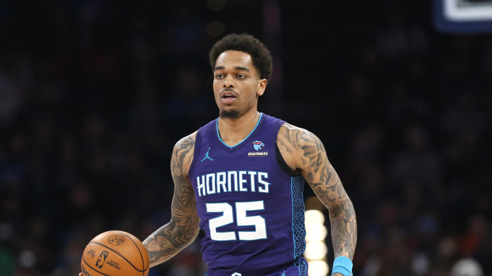 Charlotte Hornets forward P.J. Washington dribbles during the second half of an NBA basketball game against the Oklahoma City Thunder on Friday, Feb. 2, 2024, in Oklahoma City. (AP Photo/Nate Billings)