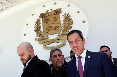 Venezuelan opposition leader Juan Guaido, who many nations have recognized as the country's rightful interim ruler, arrives to talk to the media in Caracas, Venezuela March 18, 2019. REUTERS/Ivan Alvarado