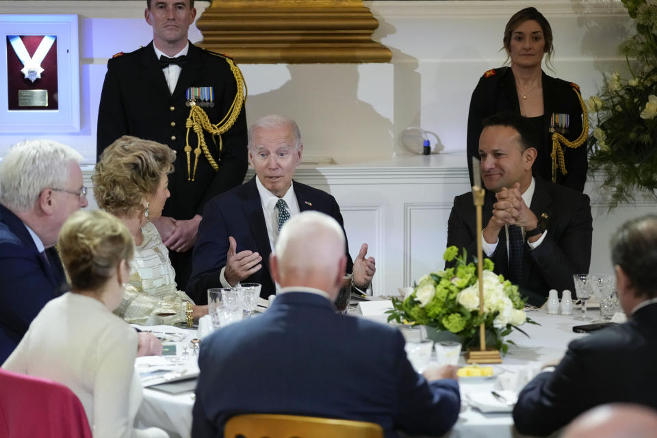 President Joe Biden, seated next to Ireland's Taoiseach Leo Varadkar at right, speaks as he attends a banquet dinner at Dublin Castle, Thursday, April 13, 2023, in Dublin, Ireland. (AP Photo/Patrick Semansky)
