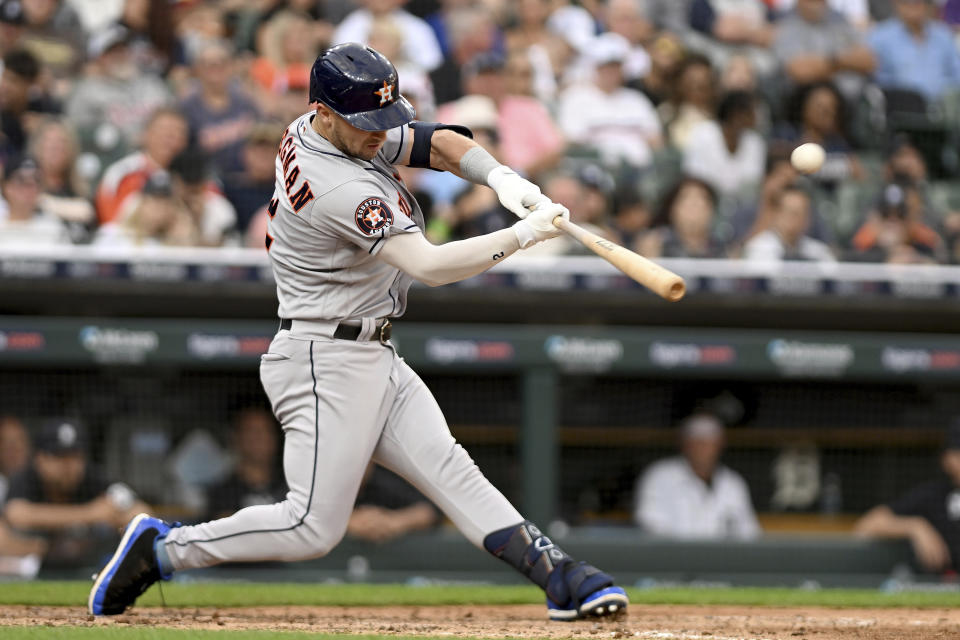 Houston Astros third baseman Alex Bregman (2) hits a two-run home run against the Detroit Tigers in the fifth inning of a baseball game, Saturday, Aug. 26, 2023 in Detroit. (AP Photo/Lon Horwedel)