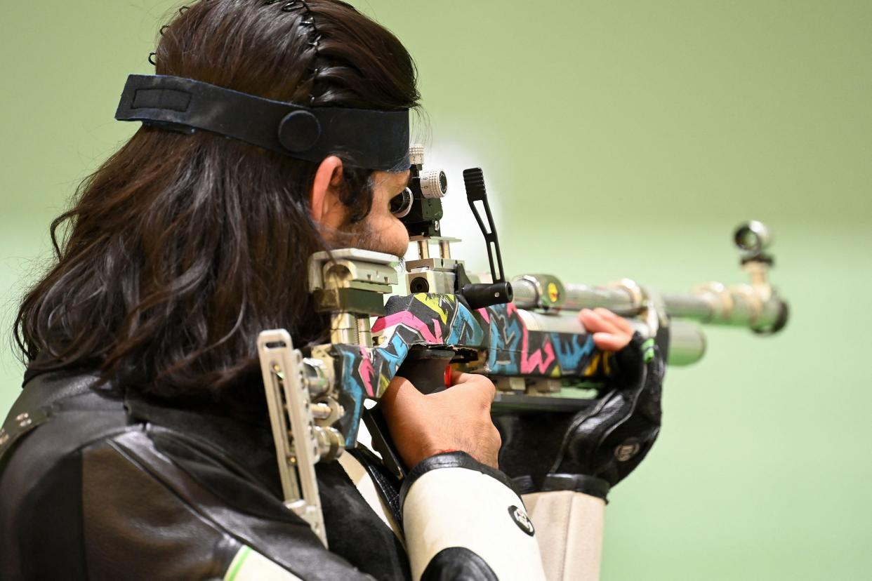 India's Divyansh Singh Panwar competes in the men's 10m air rifle qualification during the Tokyo 2020 Olympic Games at the Asaka Shooting Range in the Nerima district of Tokyo on July 25, 2021.