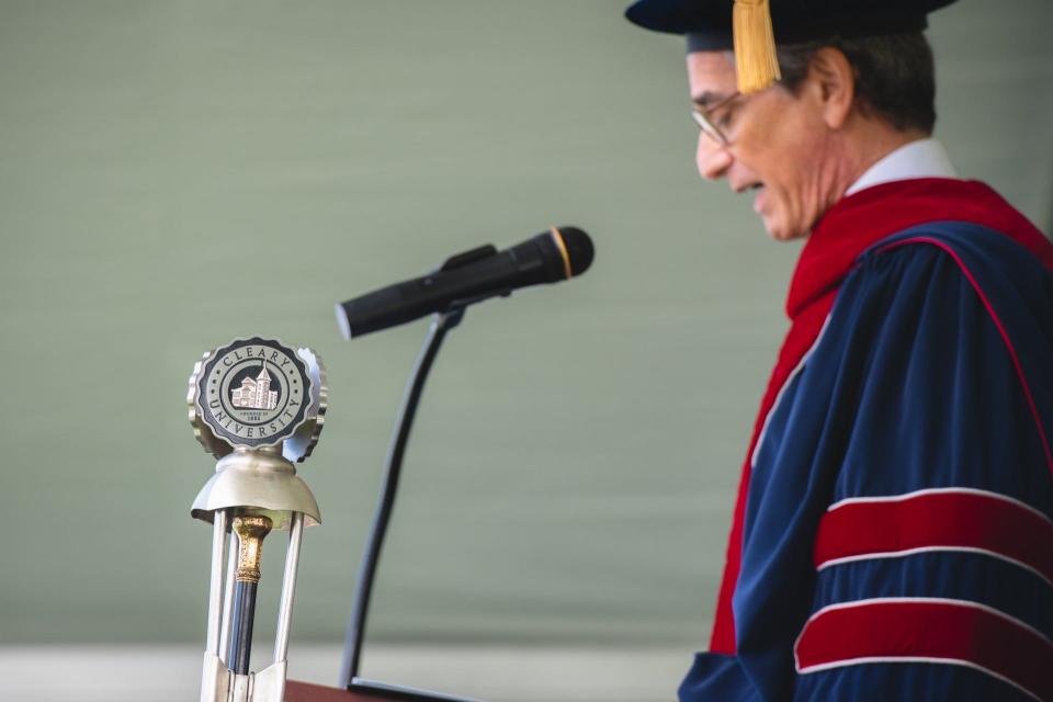 Cleary University President Alan Drimmer delivers a welcome speech Saturday, May 4.