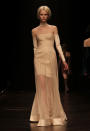 <b>LFW AW13: Marios Schwab </b><br><br>We loved this stunning nude frock with sheer detail.<br><br>© Getty