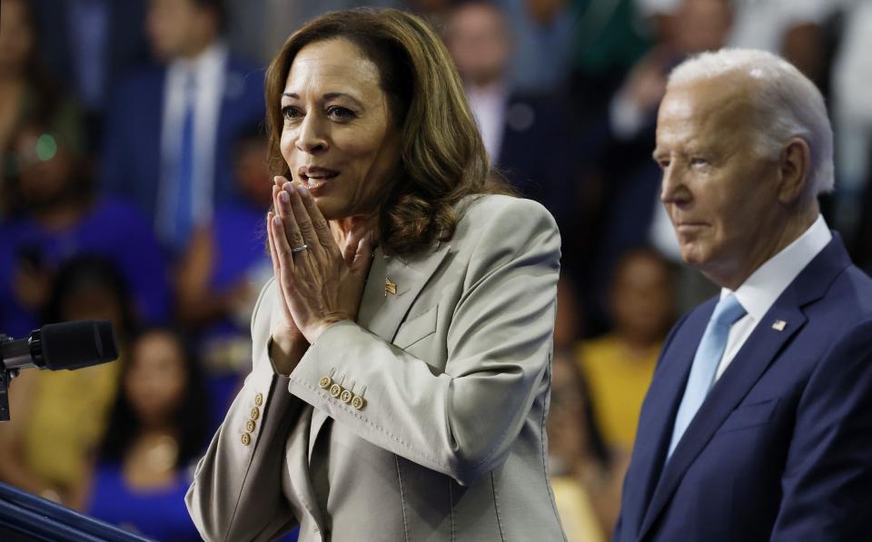 Kamala Harris alongside Joe Biden during a visit to a college in Maryland on Aug 15