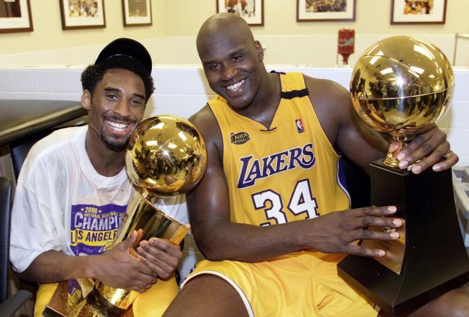 Kobe Bryant and Shaquille O'Neal | AFP via Getty Images