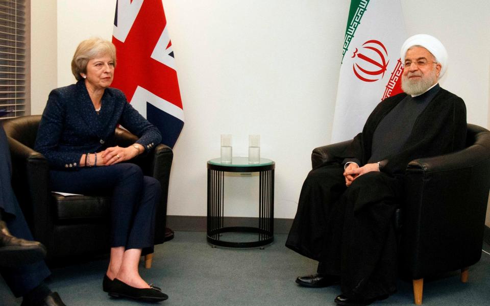 Prime Minister Theresa May meets with Iranian President Hassan Rouhani on the sidelines of the 73rd session of the United Nations General Assembly - AFP