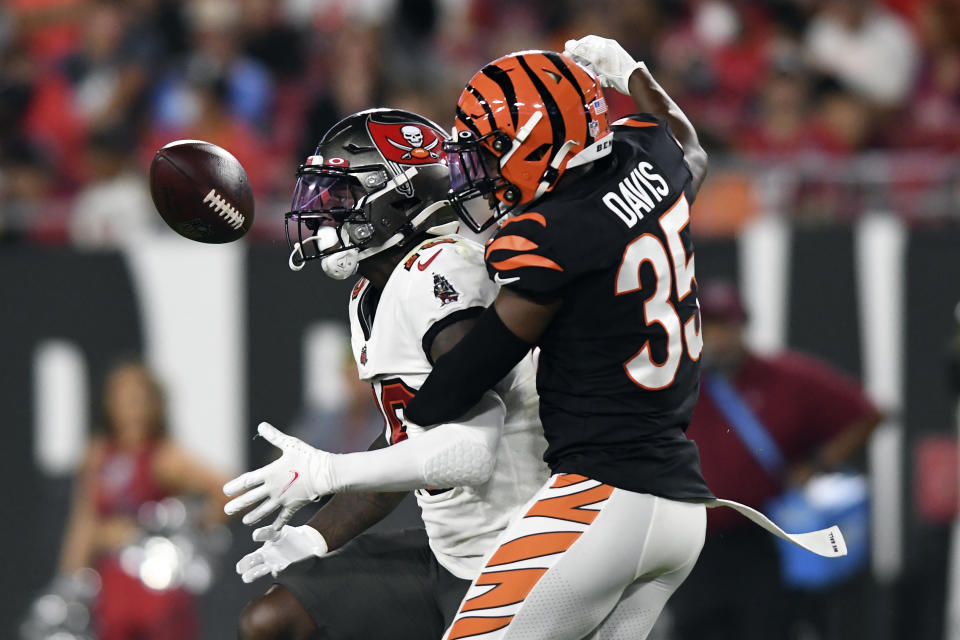 Cincinnati Bengals cornerback Jalen Davis (35) breaks up a pass intended for <a class="link " href="https://sports.yahoo.com/nfl/teams/tampa-bay/" data-i13n="sec:content-canvas;subsec:anchor_text;elm:context_link" data-ylk="slk:Tampa Bay Buccaneers;sec:content-canvas;subsec:anchor_text;elm:context_link;itc:0">Tampa Bay Buccaneers</a> wide receiver Tyler Johnson during the second half of an NFL preseason football game Saturday, Aug. 14, 2021, in Tampa, Fla. (AP Photo/Jason Behnken)