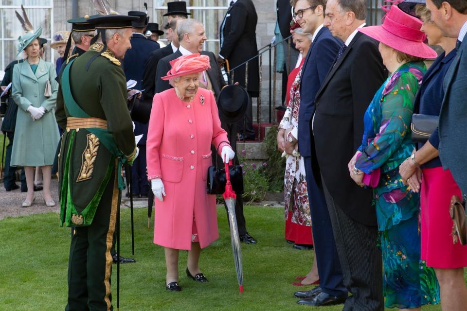 Queen Elizabeth II during a garden party at the Palace of Holyroodhouse in Edinburgh (Jane Barlow/PA) (PA Archive)