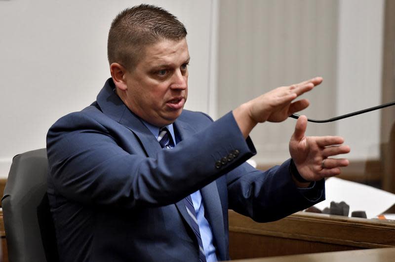 Eric DeValkenaere, a Kansas City, Mo., police detective, who shot and killed Cameron Lamb after a chase, testifies on Nov. 10, 2021, at the Jackson County Courthouse in Kansas City, Mo. (Rich Sugg/The Kansas City Star via AP, File)