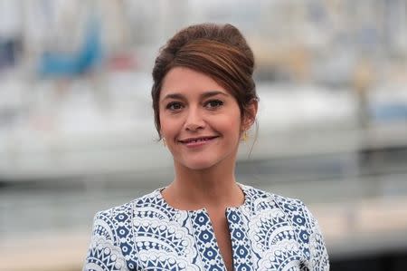 Actress Emma de Caunes poses during a photocall for the television series "Ransom" during the annual MIPCOM television programme market in Cannes, France, October 17, 2016. REUTERS/Eric Gaillard