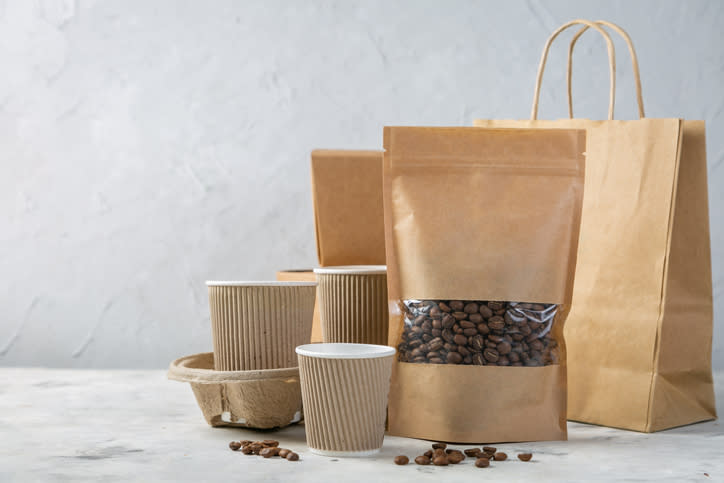 Various brown paper-based bags, cups, and containers.